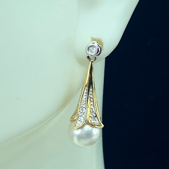 14K yellow gold 8.0mm cultured Pearl drop diamond earrings...